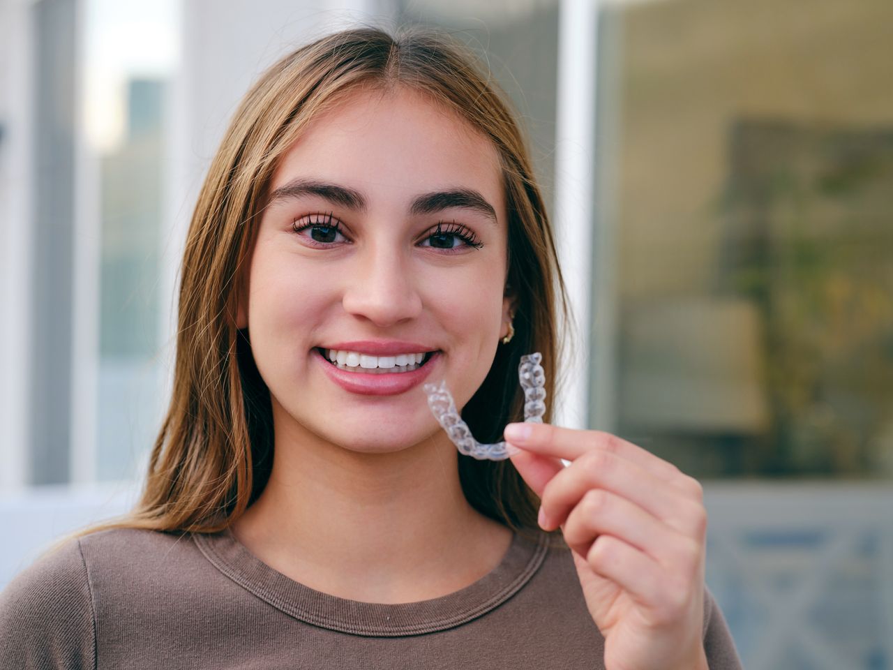 How Long Should You Really Wear a Retainer?
